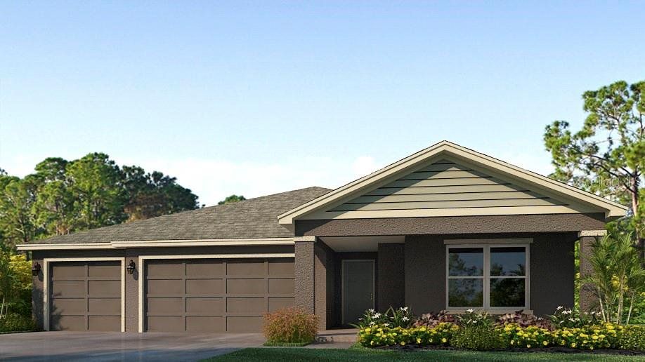 Front exterior of a new home in Oakfield Lakes, Palmetto, FL, highlighting curb appeal (Image 1). Front exterior of a new home in Oakfield Lakes, Palmetto, FL, highlighting curb appeal (Image 1).