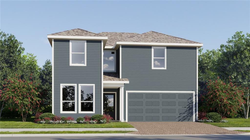 Front exterior of a new home in The Glades at Crossprairie, St. Cloud, FL, highlighting curb appeal (Image 1). Front exterior of a new home in The Glades at Crossprairie, St. Cloud, FL, highlighting curb appeal (Image 1).