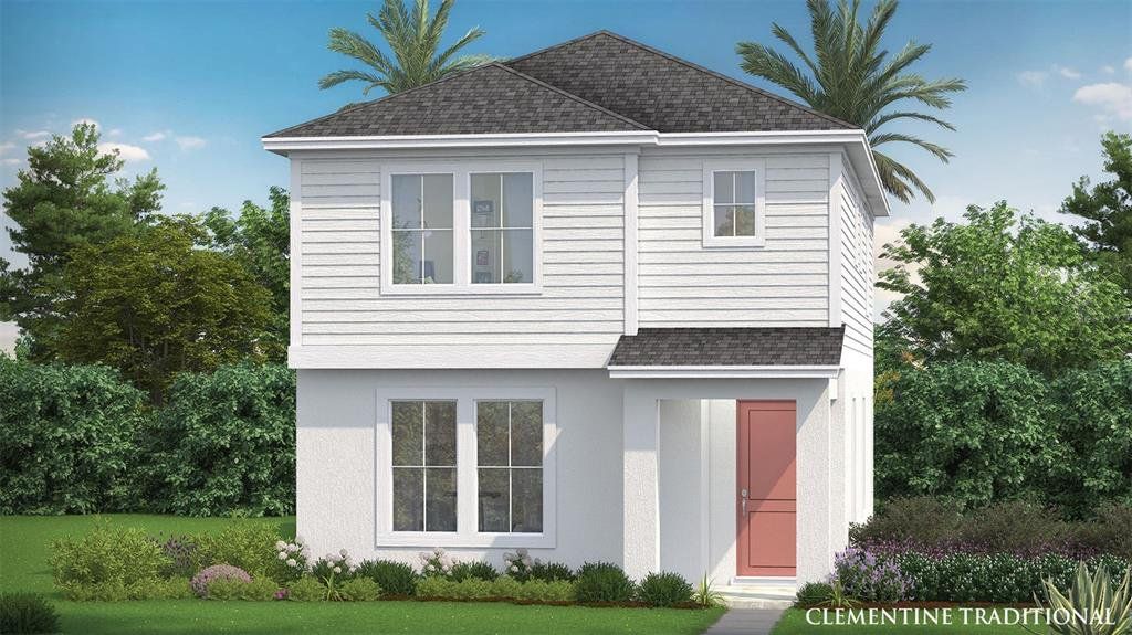Front exterior of a new home in Trinity Place, St. Cloud, FL, highlighting curb appeal (Image 1). Front exterior of a new home in Trinity Place, St. Cloud, FL, highlighting curb appeal (Image 1).
