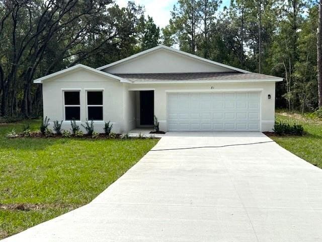 Front exterior of a new home in The Collection at Ocklawaha, Ocklawaha, FL, highlighting curb appeal (Image 1). Front exterior of a new home in The Collection at Ocklawaha, Ocklawaha, FL, highlighting curb appeal (Image 1).