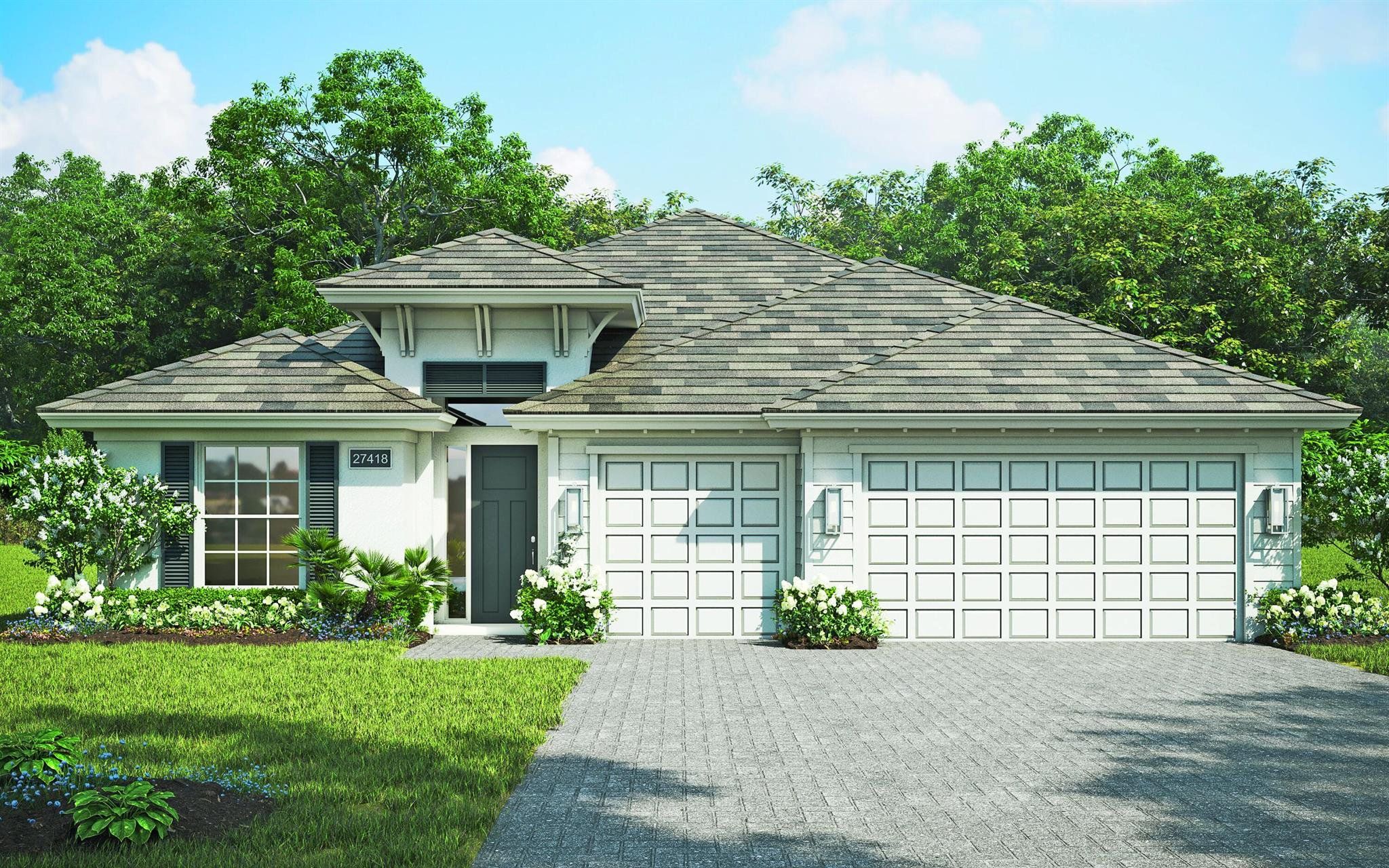 Front exterior of a new home in High Pointe, Vero Beach, FL, highlighting curb appeal (Image 1).