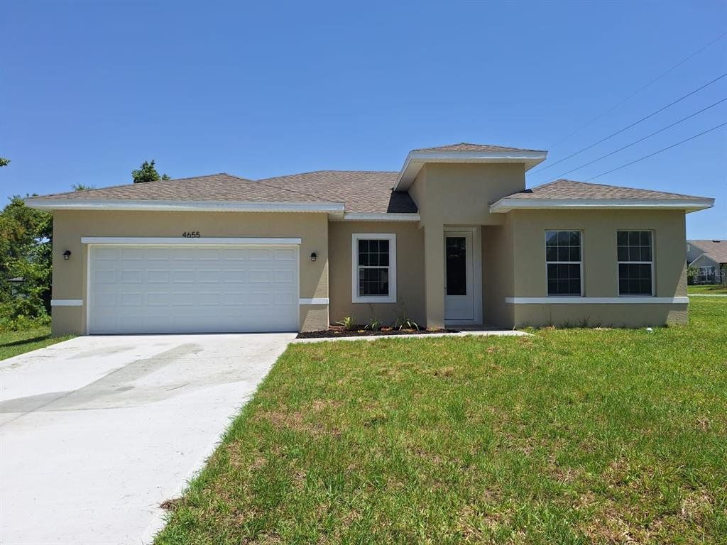 Front exterior of a new home in , Ocala, FL, highlighting curb appeal (Image 1). Front exterior of a new home in , Ocala, FL, highlighting curb appeal (Image 1).