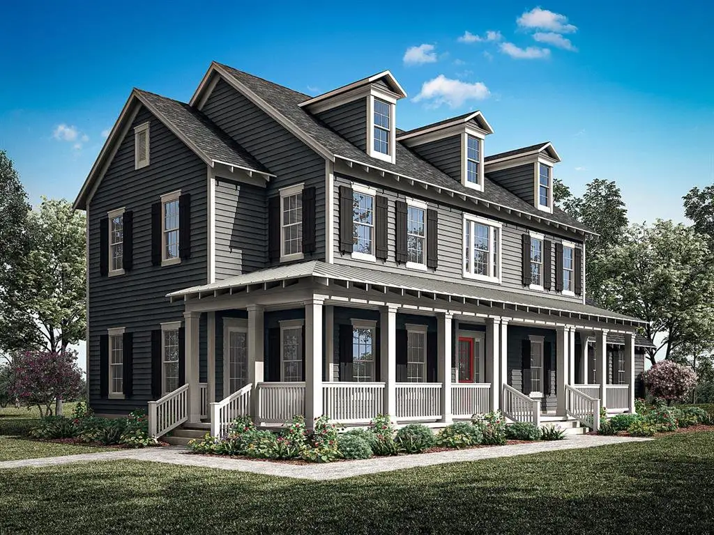 Front exterior of a new home in Celebration - Island Village, Celebration, FL, highlighting curb appeal (Image 1). Front exterior of a new home in Celebration - Island Village, Celebration, FL, highlighting curb appeal (Image 1).