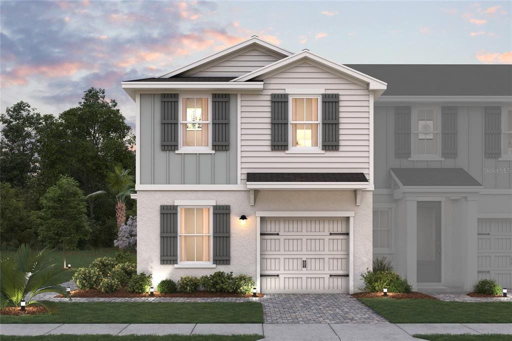 Front exterior of a new home in Aspire at Canter Creek, Davenport, FL, highlighting curb appeal (Image 1). Front exterior of a new home in Aspire at Canter Creek, Davenport, FL, highlighting curb appeal (Image 1).
