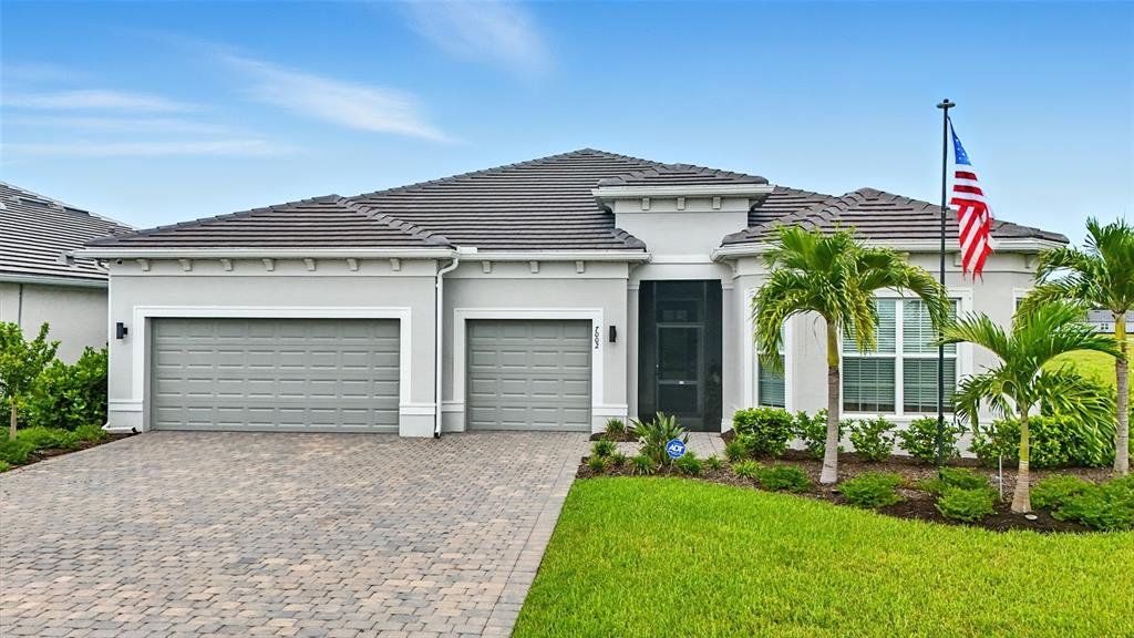 Front exterior of a new home in , North Fort Myers, FL, highlighting curb appeal (Image 1). Front exterior of a new home in , North Fort Myers, FL, highlighting curb appeal (Image 1).
