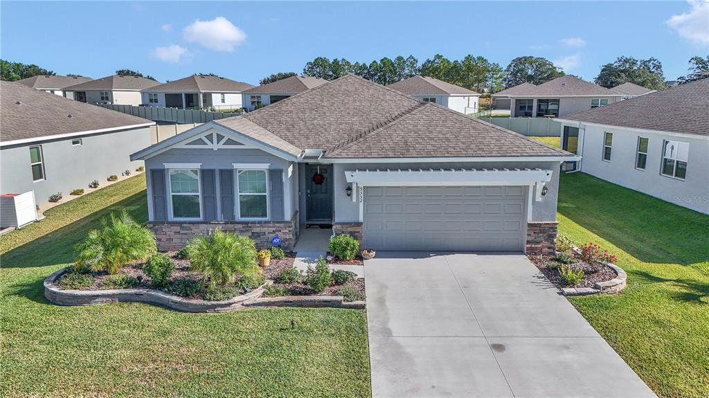 Front exterior of a new home in JB Ranch, Ocala, FL, highlighting curb appeal (Image 1). Front exterior of a new home in JB Ranch, Ocala, FL, highlighting curb appeal (Image 1).