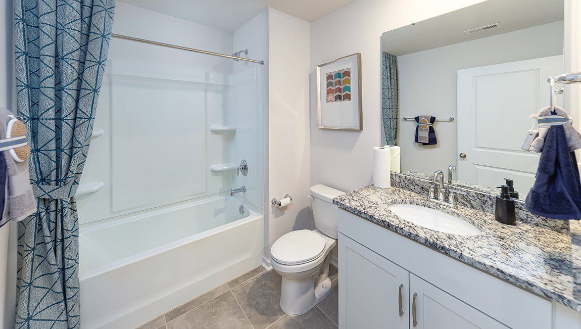 Representative furnished interior of a home built from the Livia by D.R. Horton in Blackstone Bay Townhomes, Sherrills Ford (Image 1).
