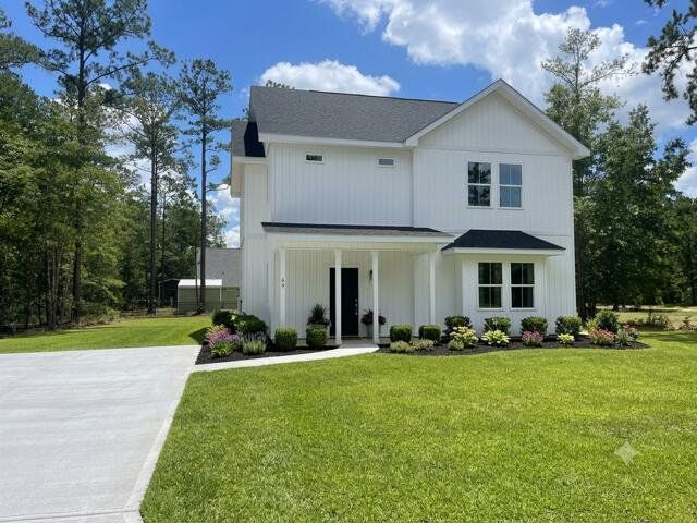 Front exterior of a new home in , Walterboro, SC, highlighting curb appeal (Image 1). Front exterior of a new home in , Walterboro, SC, highlighting curb appeal (Image 1).