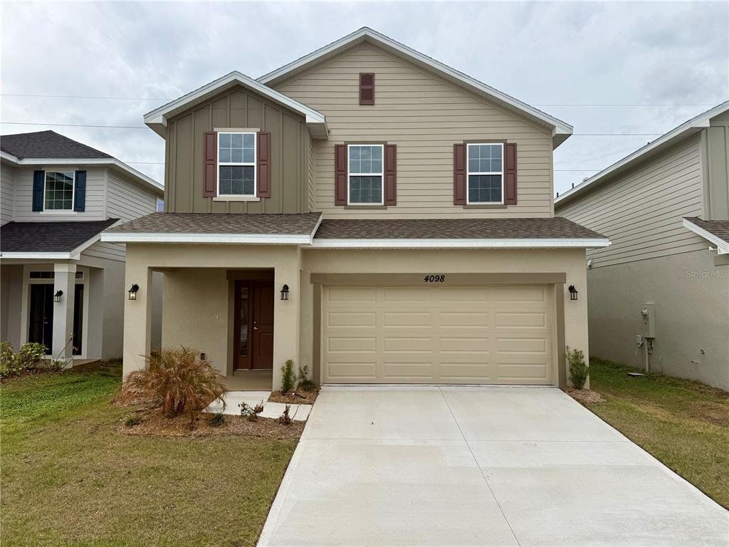 Front exterior of a new home in Harmony Central, St. Cloud, FL, highlighting curb appeal (Image 1). Front exterior of a new home in Harmony Central, St. Cloud, FL, highlighting curb appeal (Image 1).