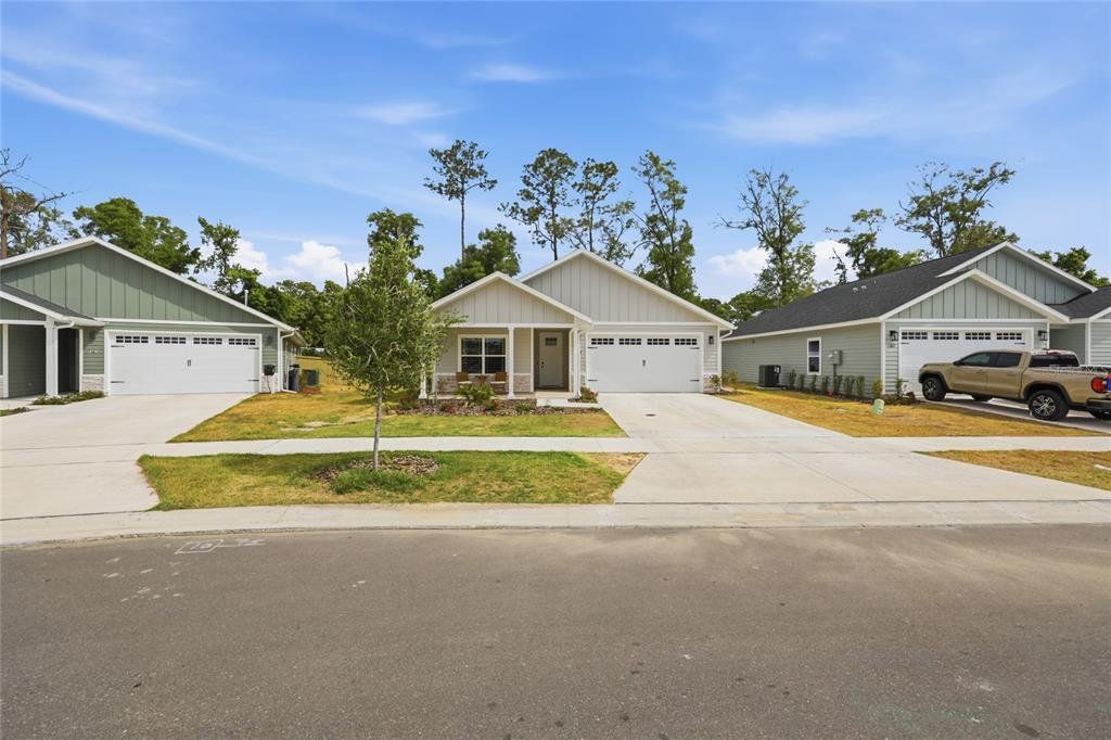 Front exterior of a new home in , Gainesville, FL, highlighting curb appeal (Image 1). Front exterior of a new home in , Gainesville, FL, highlighting curb appeal (Image 1).