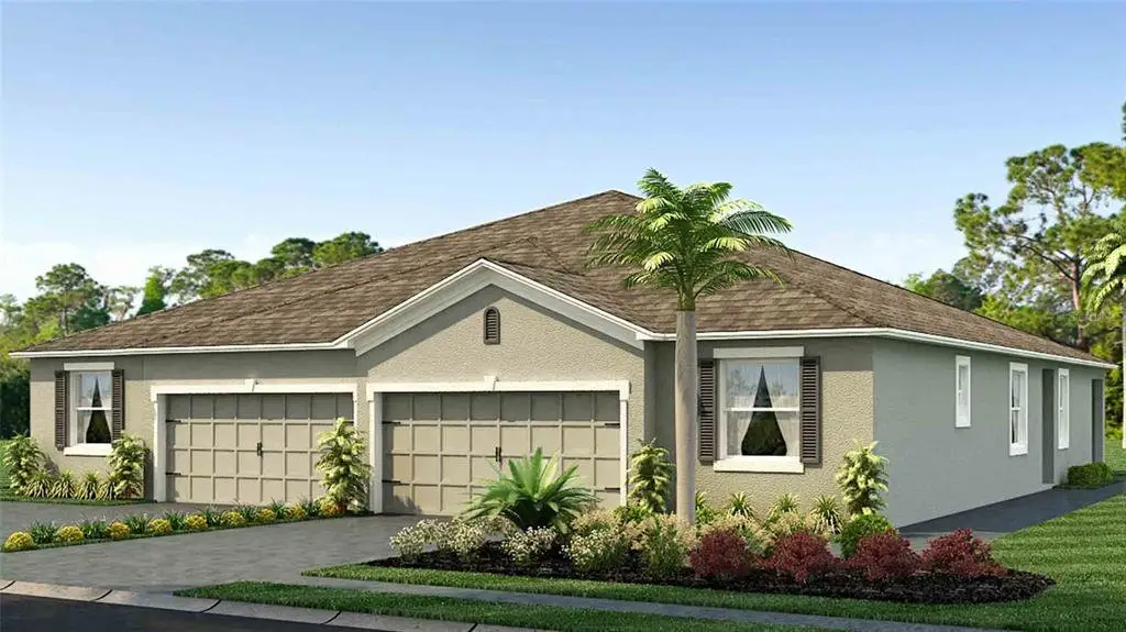 Front exterior of a new home in Towns at Woodsdale Villas, Wesley Chapel, FL, highlighting curb appeal (Image 1).