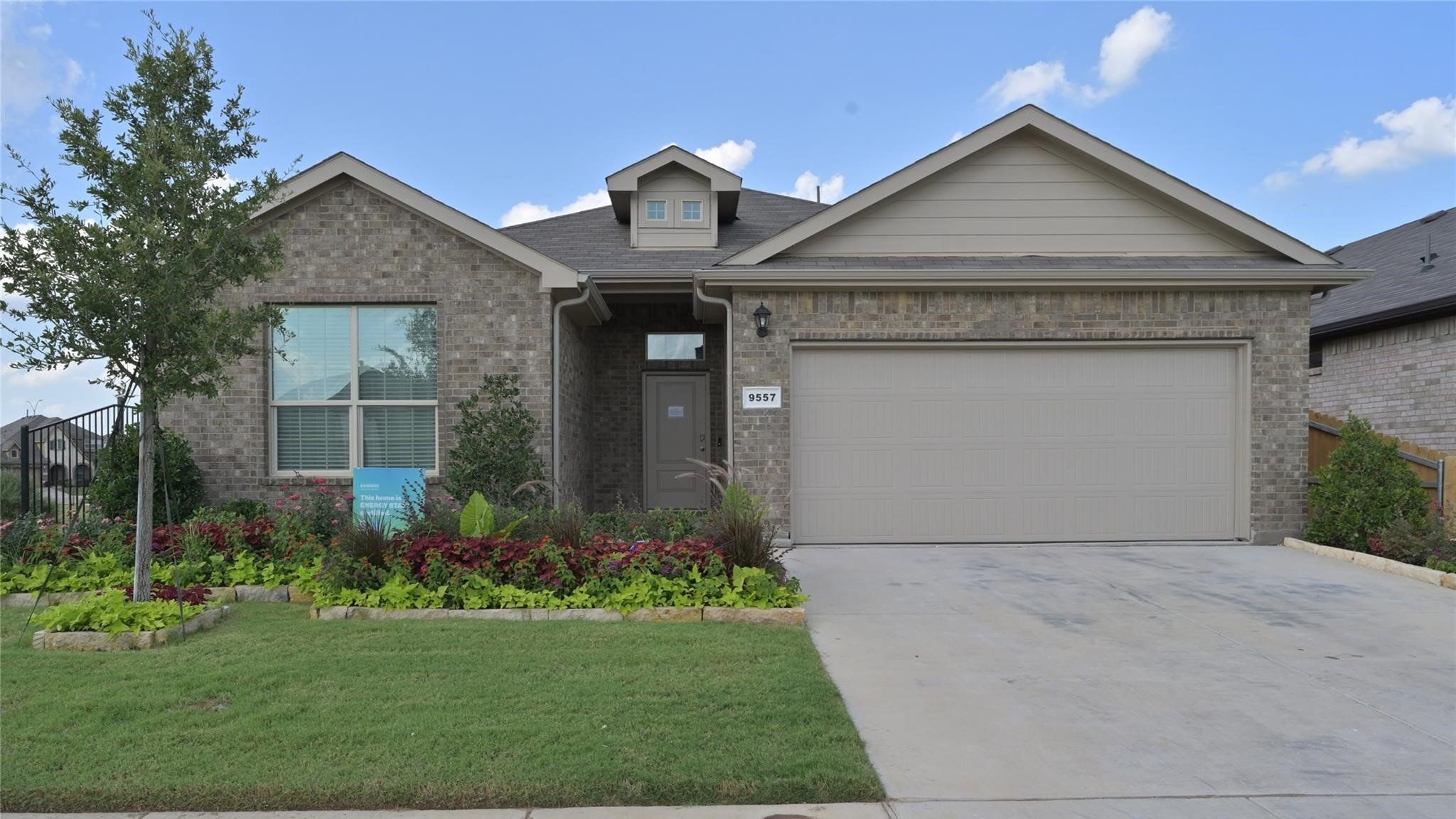 Representative exterior photo of a completed home built from the OXFORD by D.R. Horton in Springhill South, Boyd, TX (Image 1).