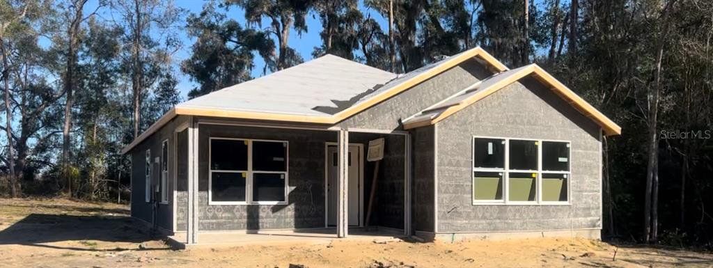 Front exterior of a new home in , Belleview, FL, highlighting curb appeal (Image 1). Front exterior of a new home in , Belleview, FL, highlighting curb appeal (Image 1).