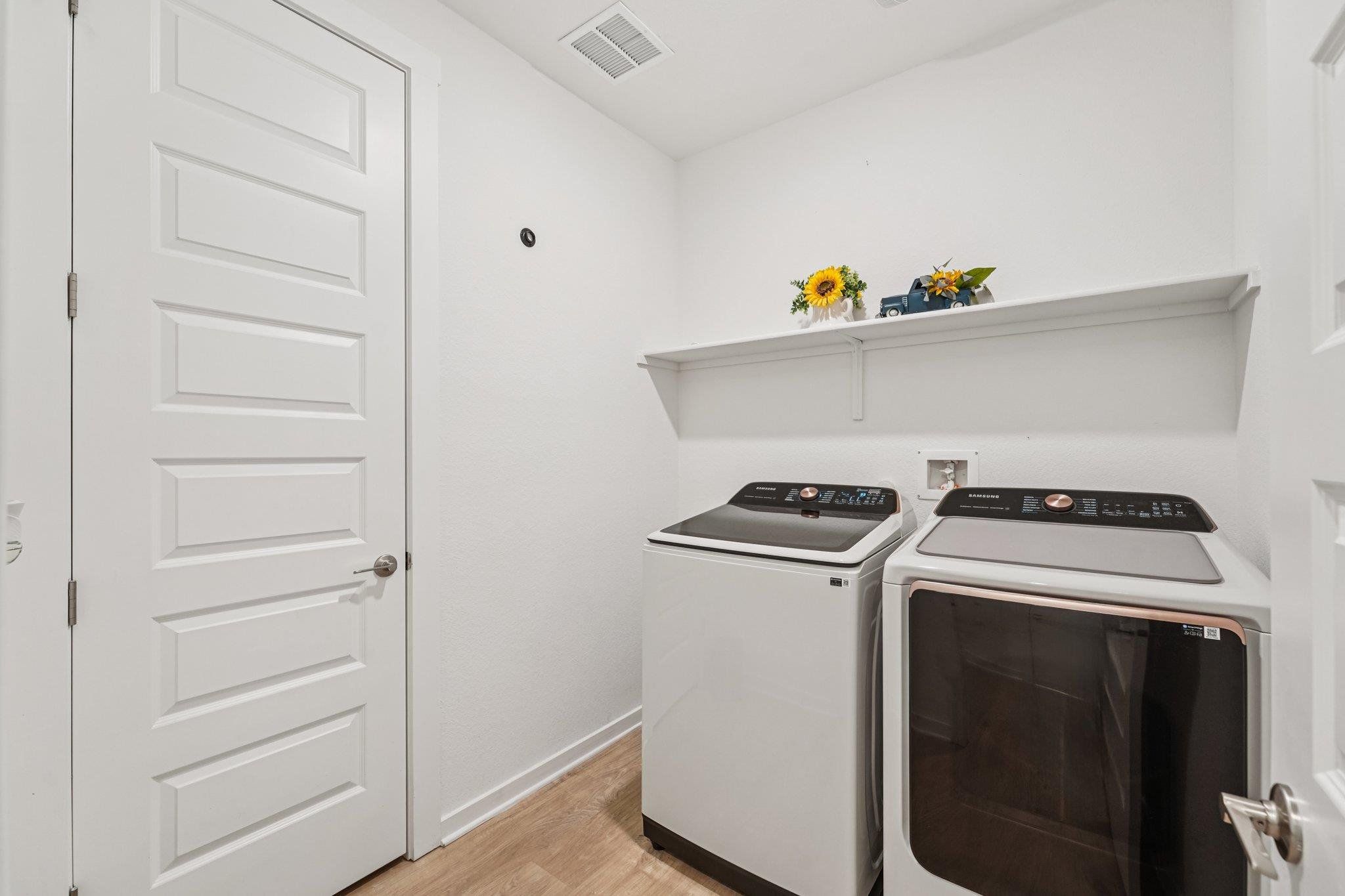 Furnished interior view inside a new home in Rosenbusch Ranch, Leander (Image 1).