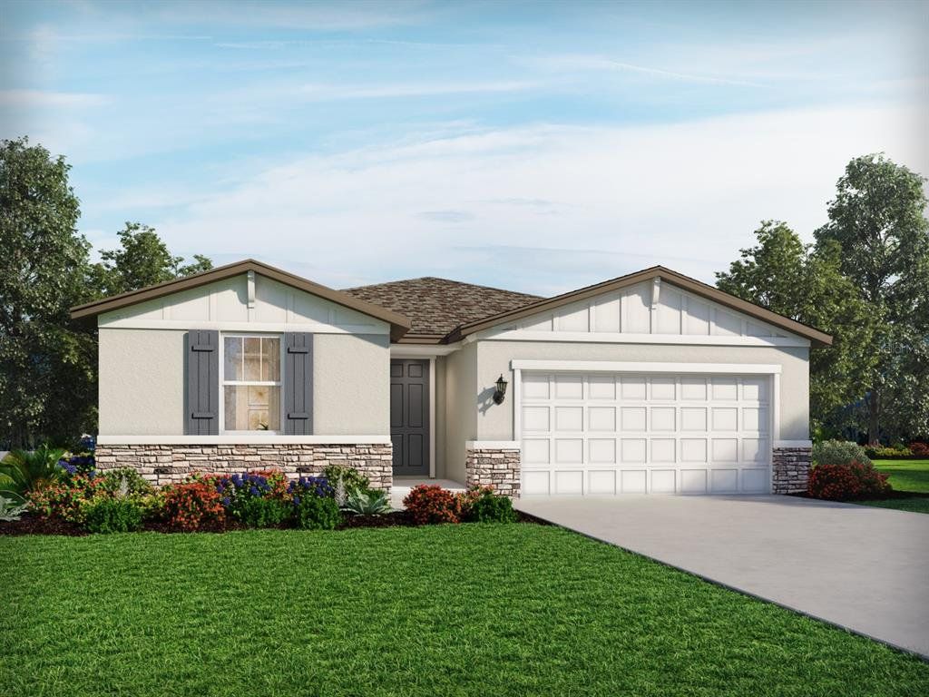 Front exterior of a new home in The Grove at Stuart Crossing - Classic Series, Bartow, FL, highlighting curb appeal (Image 1). Front exterior of a new home in The Grove at Stuart Crossing - Classic Series, Bartow, FL, highlighting curb appeal (Image 1).