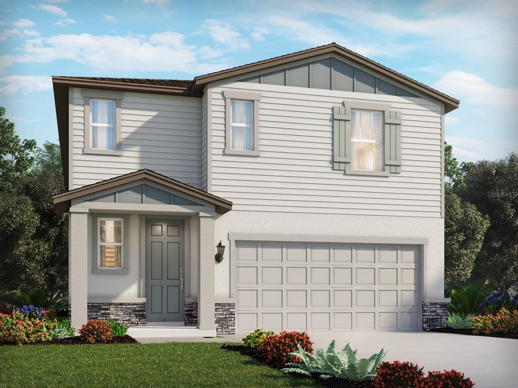 Front exterior of a new home in Coasterra - Premier Series, Palmetto, FL, highlighting curb appeal (Image 1). Front exterior of a new home in Coasterra - Premier Series, Palmetto, FL, highlighting curb appeal (Image 1).