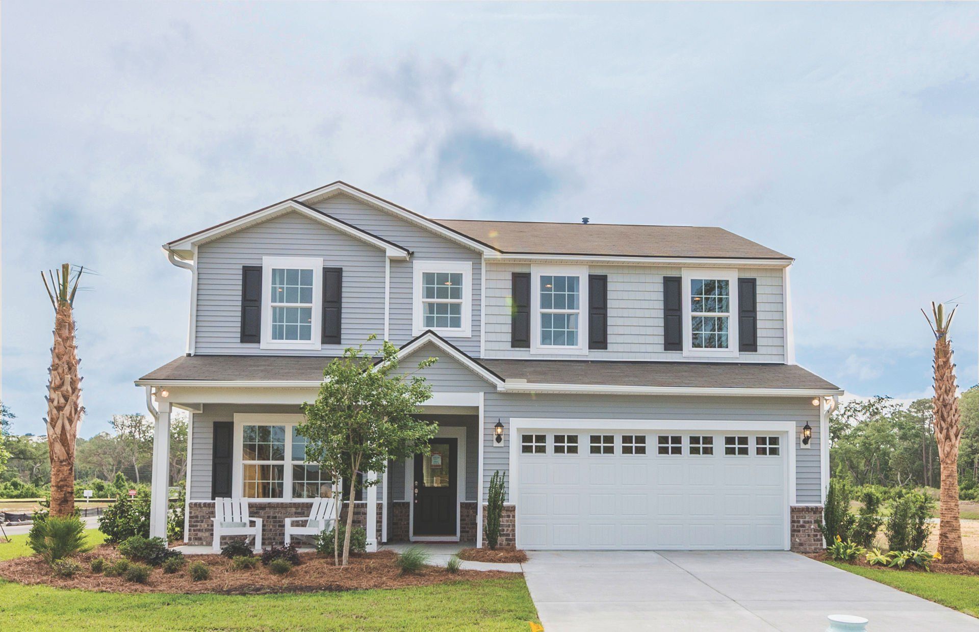 Front exterior of a new home in Carriage Estates, Lexington, SC, highlighting curb appeal (Image 1).