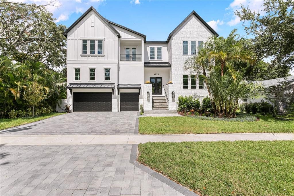 Front exterior of a new home in , Tampa, FL, highlighting curb appeal (Image 1). Front exterior of a new home in , Tampa, FL, highlighting curb appeal (Image 1).