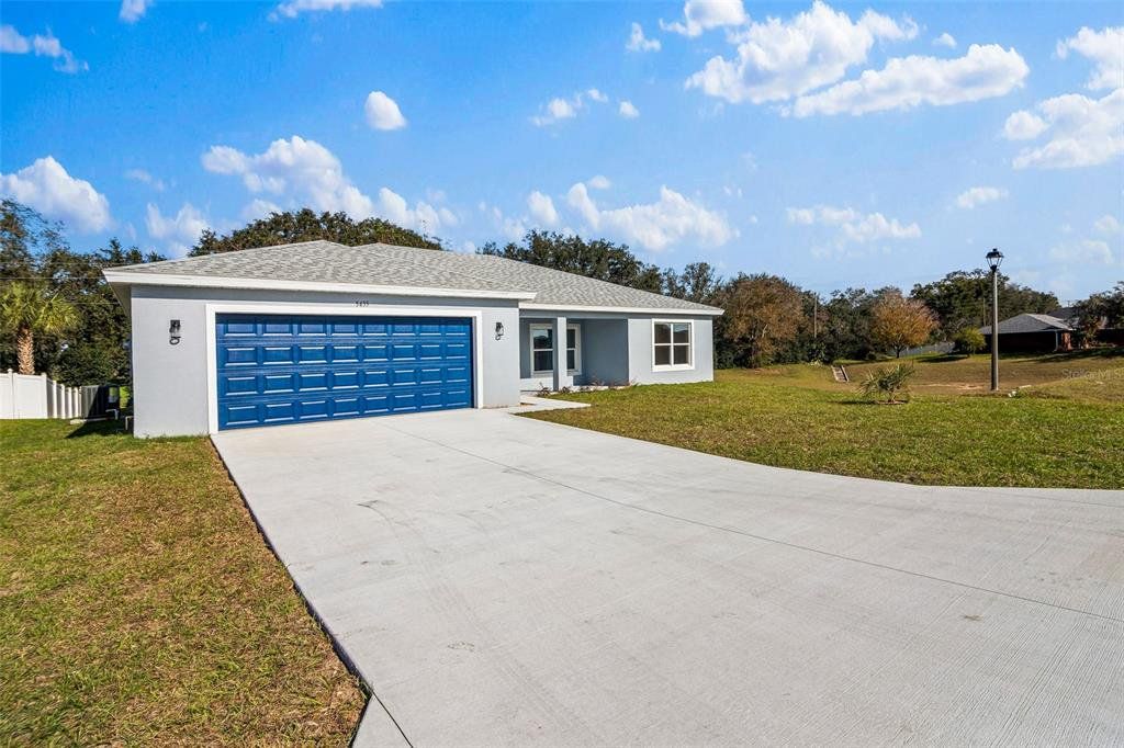 Front exterior of a new home in , Ocala, FL, highlighting curb appeal (Image 1). Front exterior of a new home in , Ocala, FL, highlighting curb appeal (Image 1).