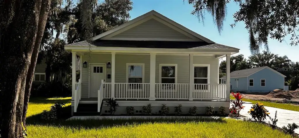 Front exterior of a new home in , Plant City, FL, highlighting curb appeal (Image 1). Front exterior of a new home in , Plant City, FL, highlighting curb appeal (Image 1).