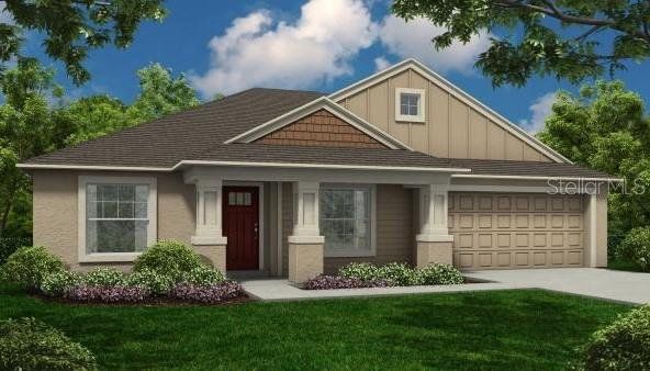 Front exterior of a new home in , Indian Lake Estates, FL, highlighting curb appeal (Image 1). Front exterior of a new home in , Indian Lake Estates, FL, highlighting curb appeal (Image 1).