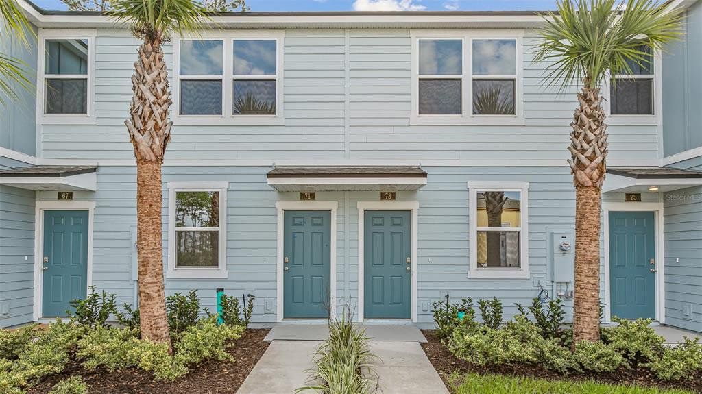 Front exterior of a new home in Stokes Landing, St. Augustine, FL, highlighting curb appeal (Image 1). Front exterior of a new home in Stokes Landing, St. Augustine, FL, highlighting curb appeal (Image 1).