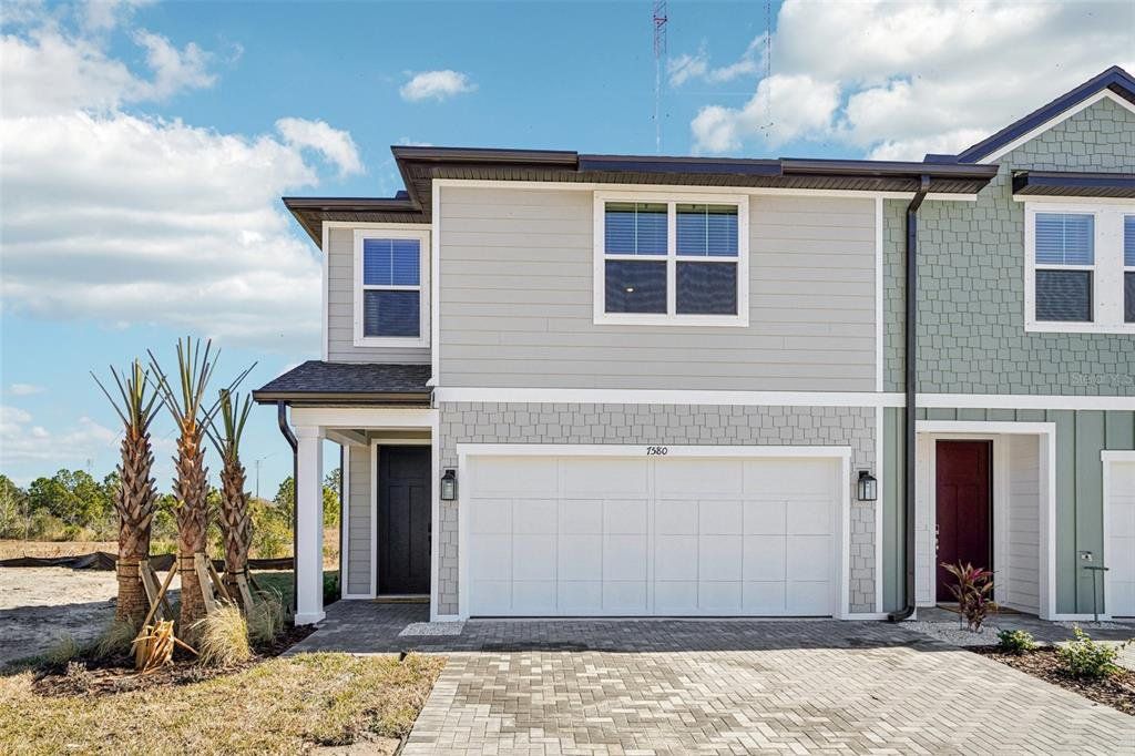 Front exterior of a new home in Montague Chase, Tampa, FL, highlighting curb appeal (Image 1). Front exterior of a new home in Montague Chase, Tampa, FL, highlighting curb appeal (Image 1).