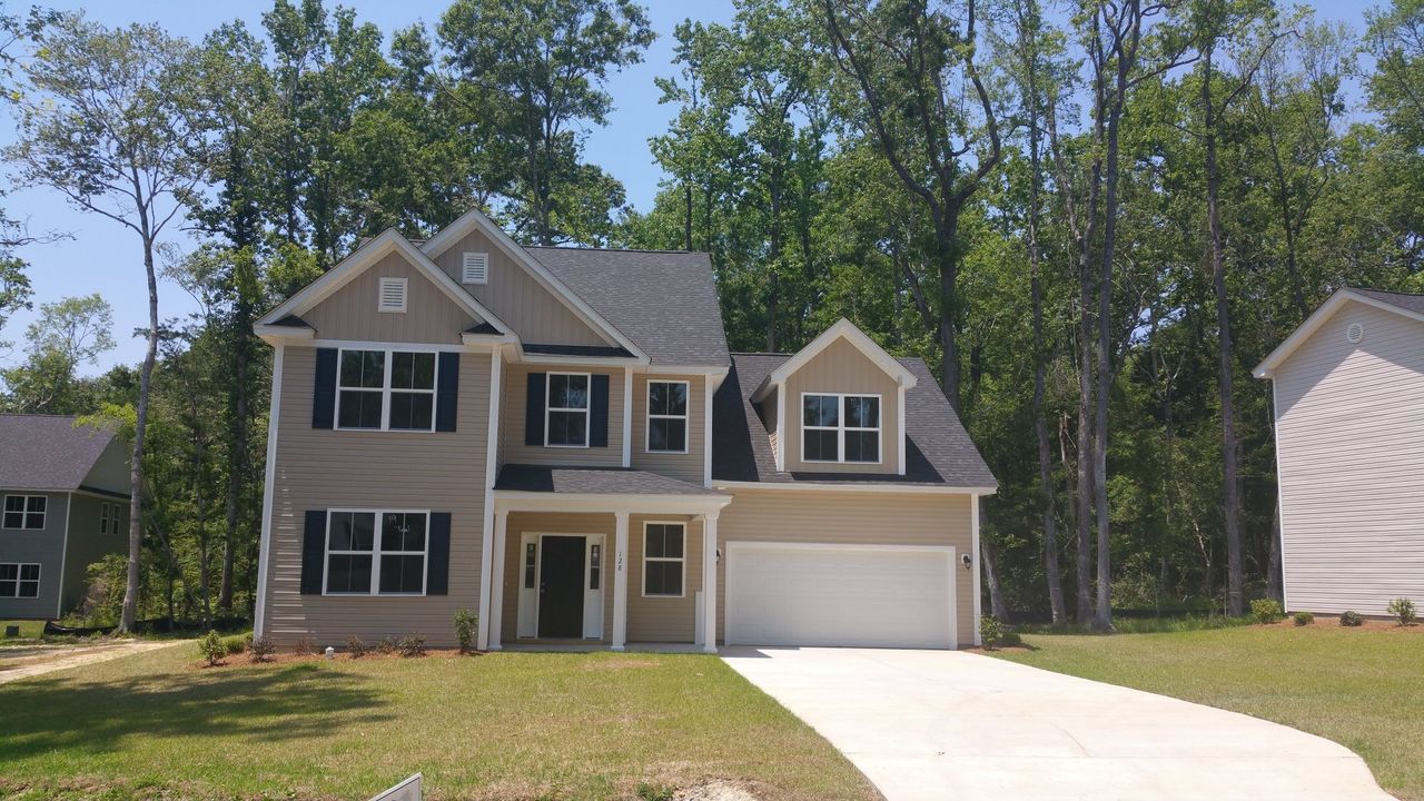 A showcase of a new construction home by Palmetto Signature Homes, highlighting their design and quality (Image 2).