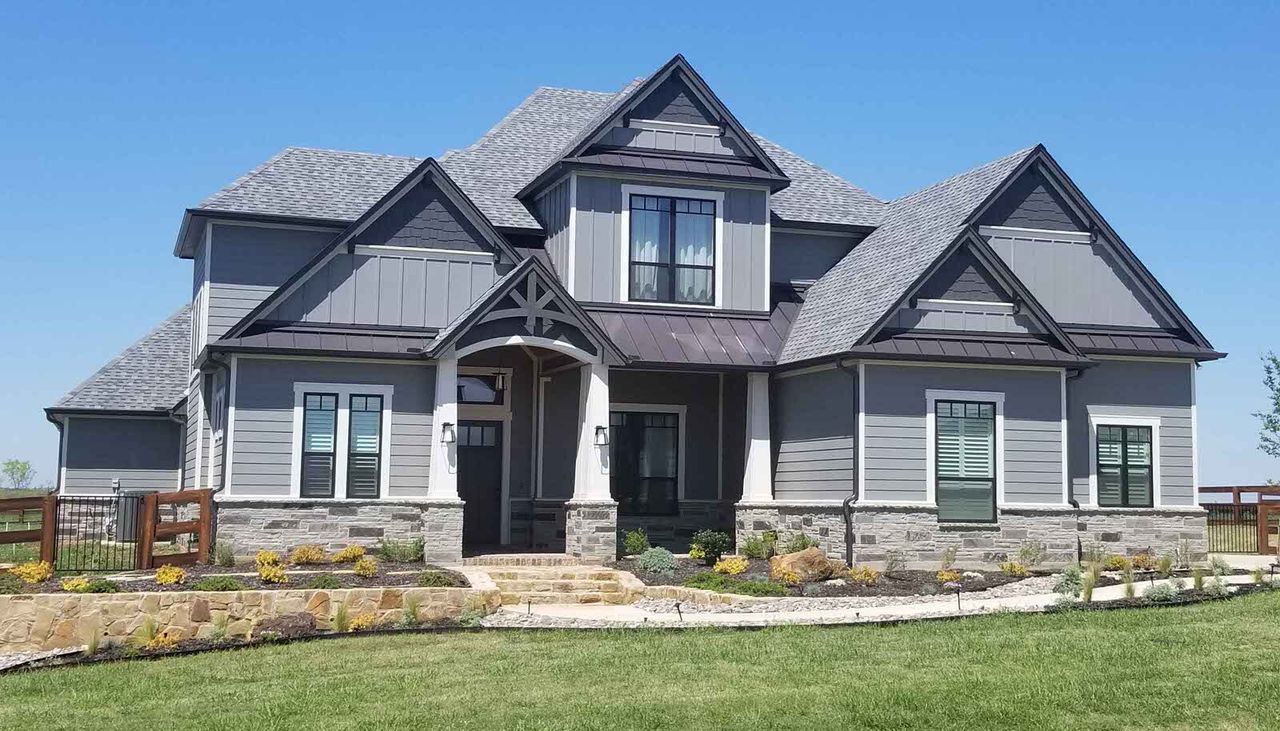 A showcase of a new construction home by PROVIDENTIAL CUSTOM HOMES, highlighting their design and quality (Image 2).