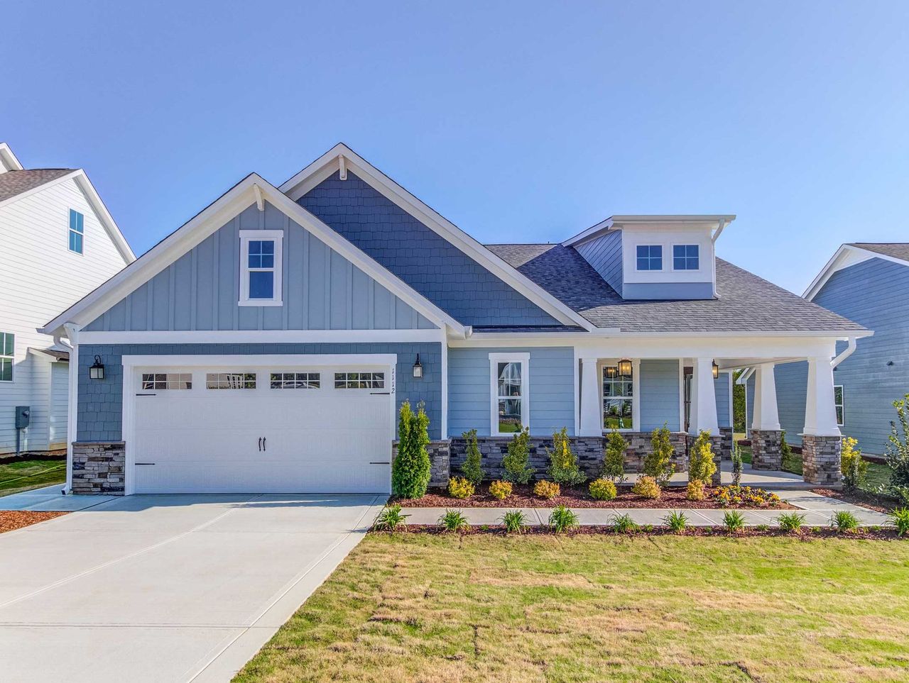 Front exterior of a home in the Cedar Crest - Fuquay-Varina - Robuck Homes community, located in Fuquay Varina, NC (Image 2). Front exterior of a home in the Cedar Crest - Fuquay-Varina - Robuck Homes community, located in Fuquay Varina, NC (Image 2).