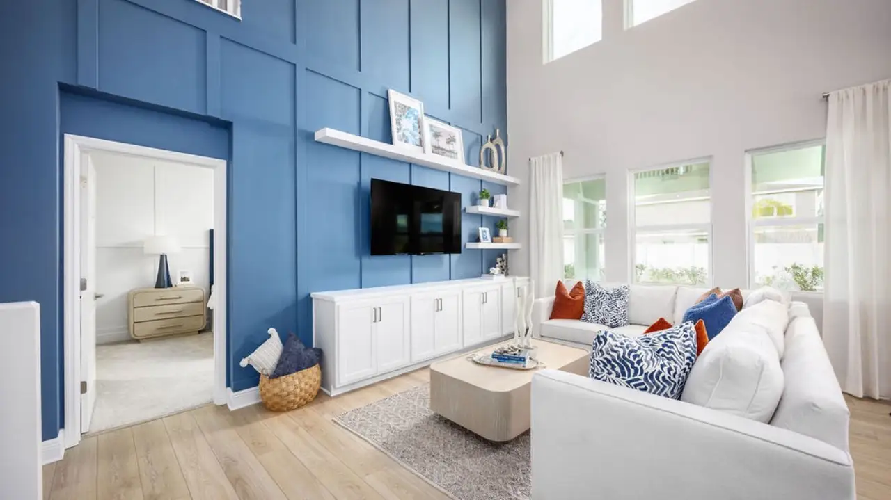 Furnished interior in a model home at Cypress Reserve in Clermont (Image 2).