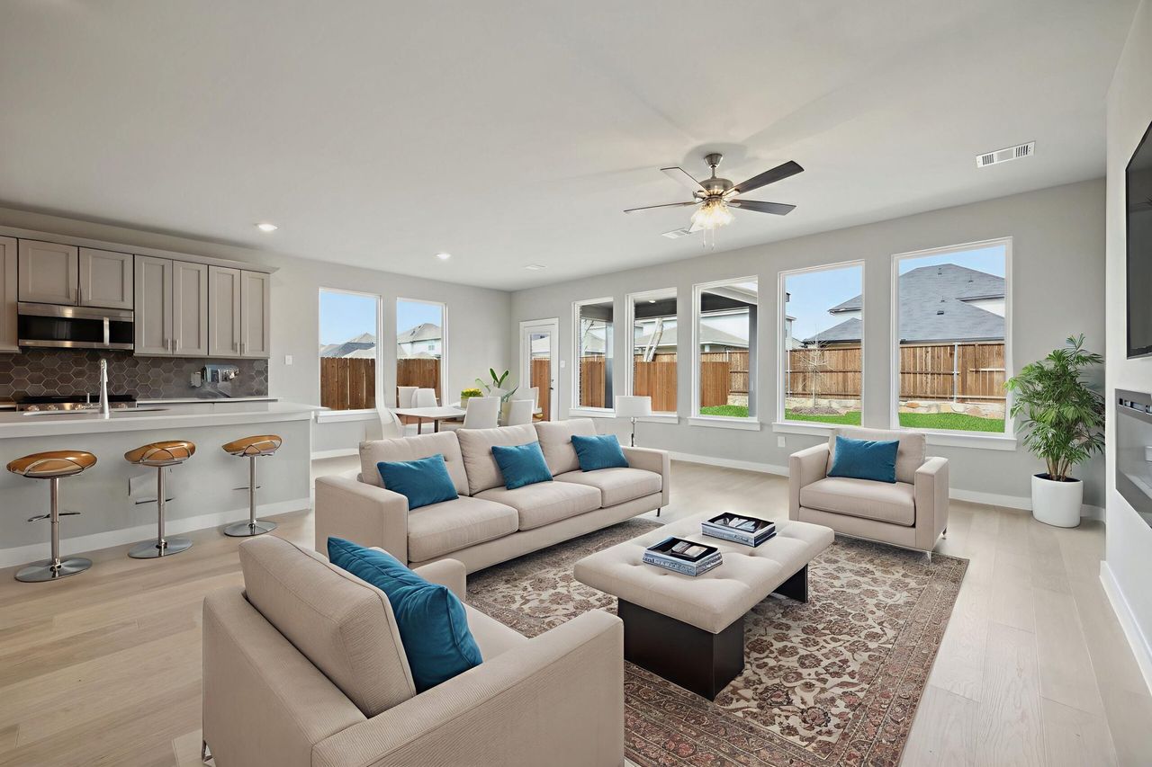 Furnished interior in a model home at South Meadow in Melissa (Image 2).