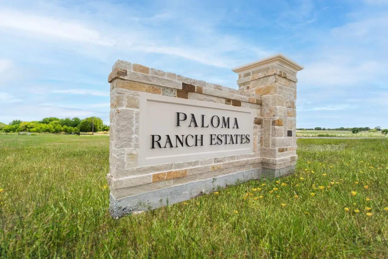 Entrance to the Paloma Ranch community in Justin, TX, featuring signage and landscaping (Image 2).