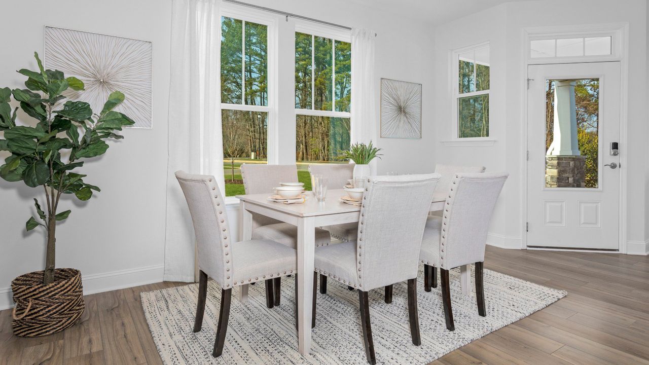 Furnished interior in a model home at Weldon Village Townhomes in Franklinton (Image 2).