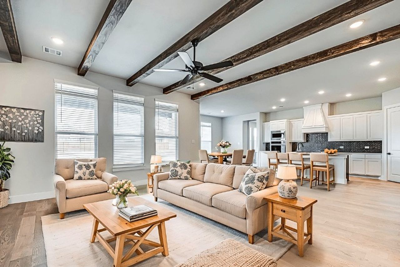Furnished interior in a model home at Emerson Farms in Rockwall (Image 2).