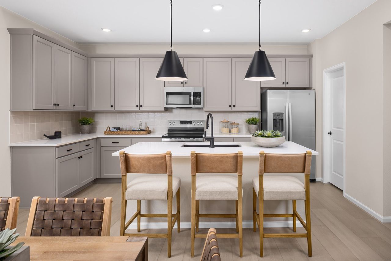 Furnished interior in a model home at The Legacy Collection at Mead Crossing in Mead (Image 2).