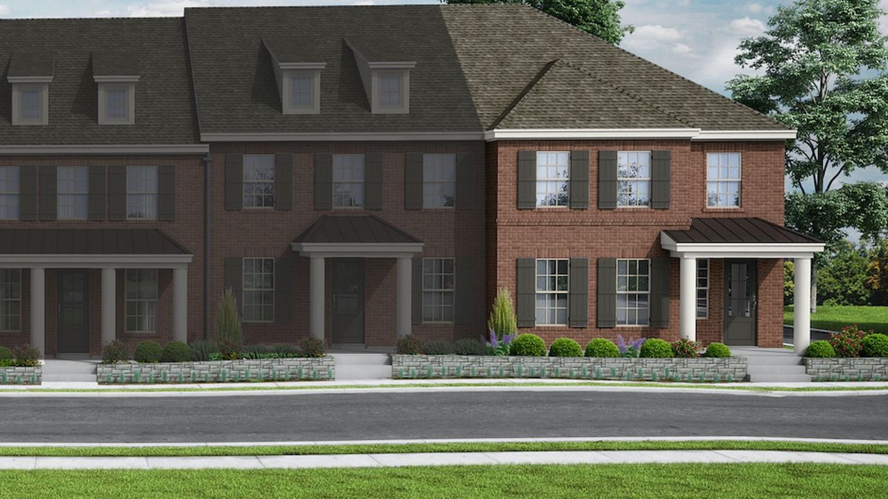 Image 2 of the Thomas Place Townhomes community in Carrollton, TX.