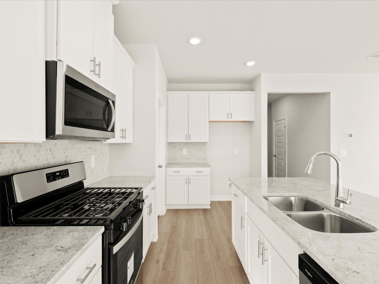 Furnished interior in a model home at Brayfield Manor - Signature Collection in Wellford (Image 2).