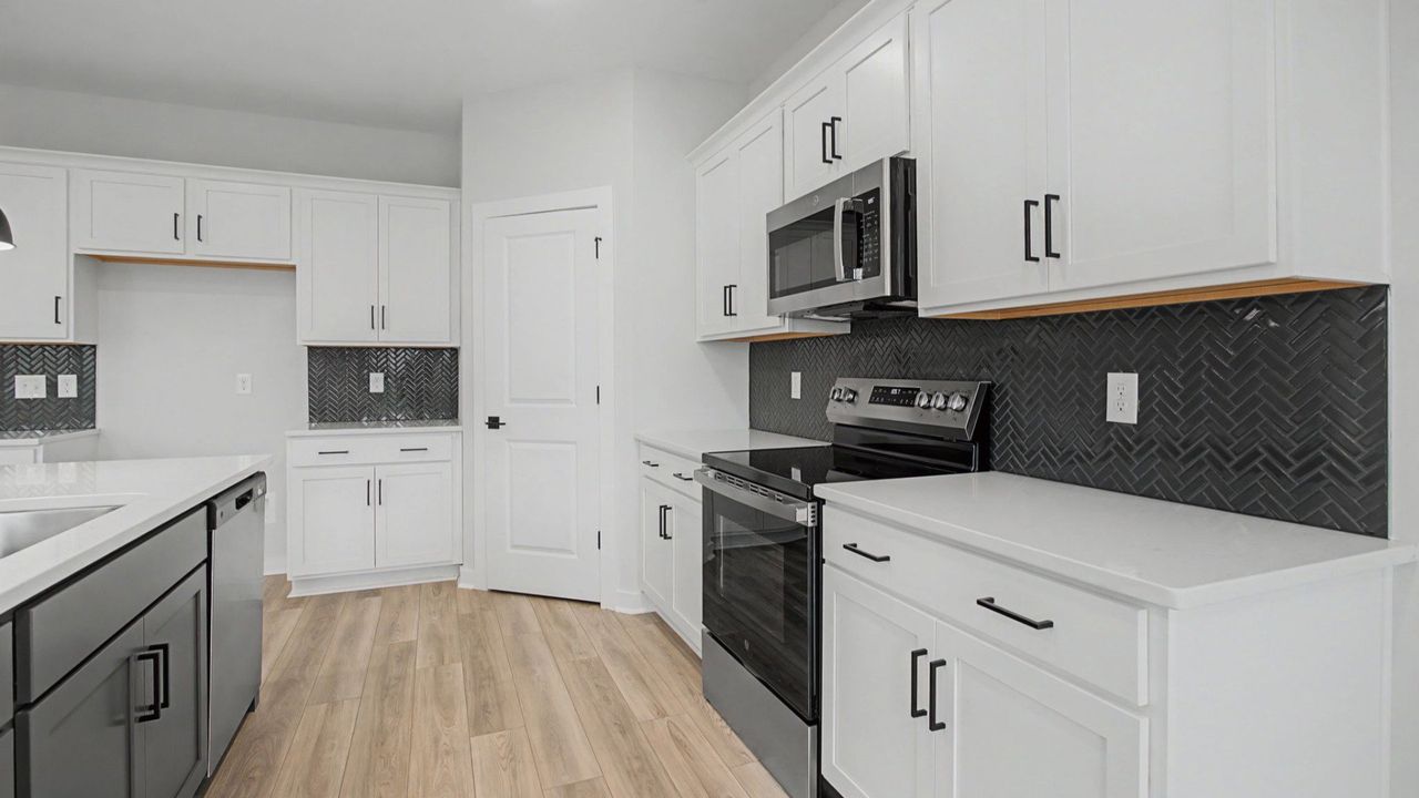 Furnished interior in a model home at Hartmann Landing in Lebanon (Image 2).