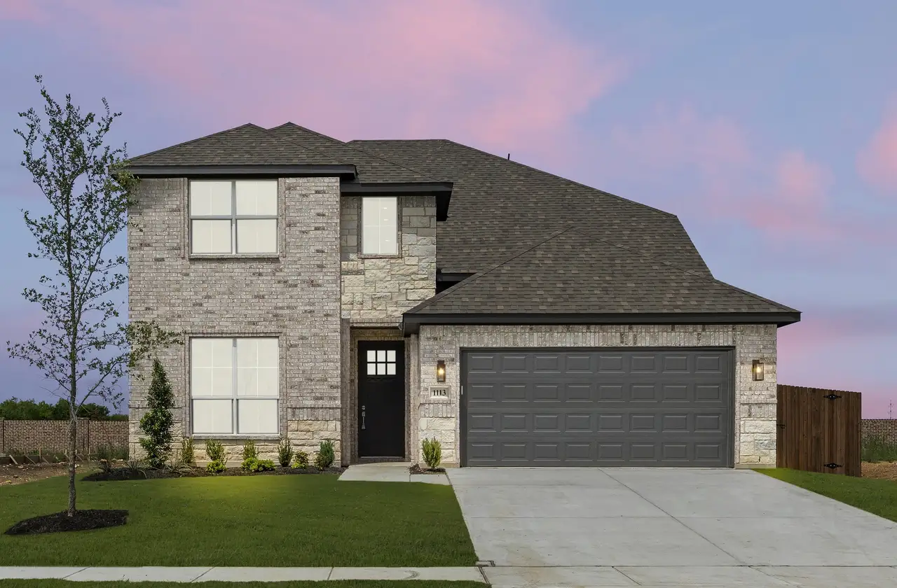 Front exterior of a home in the Meadow Park at The Meadows community, located in Krugerville, TX (Image 2).