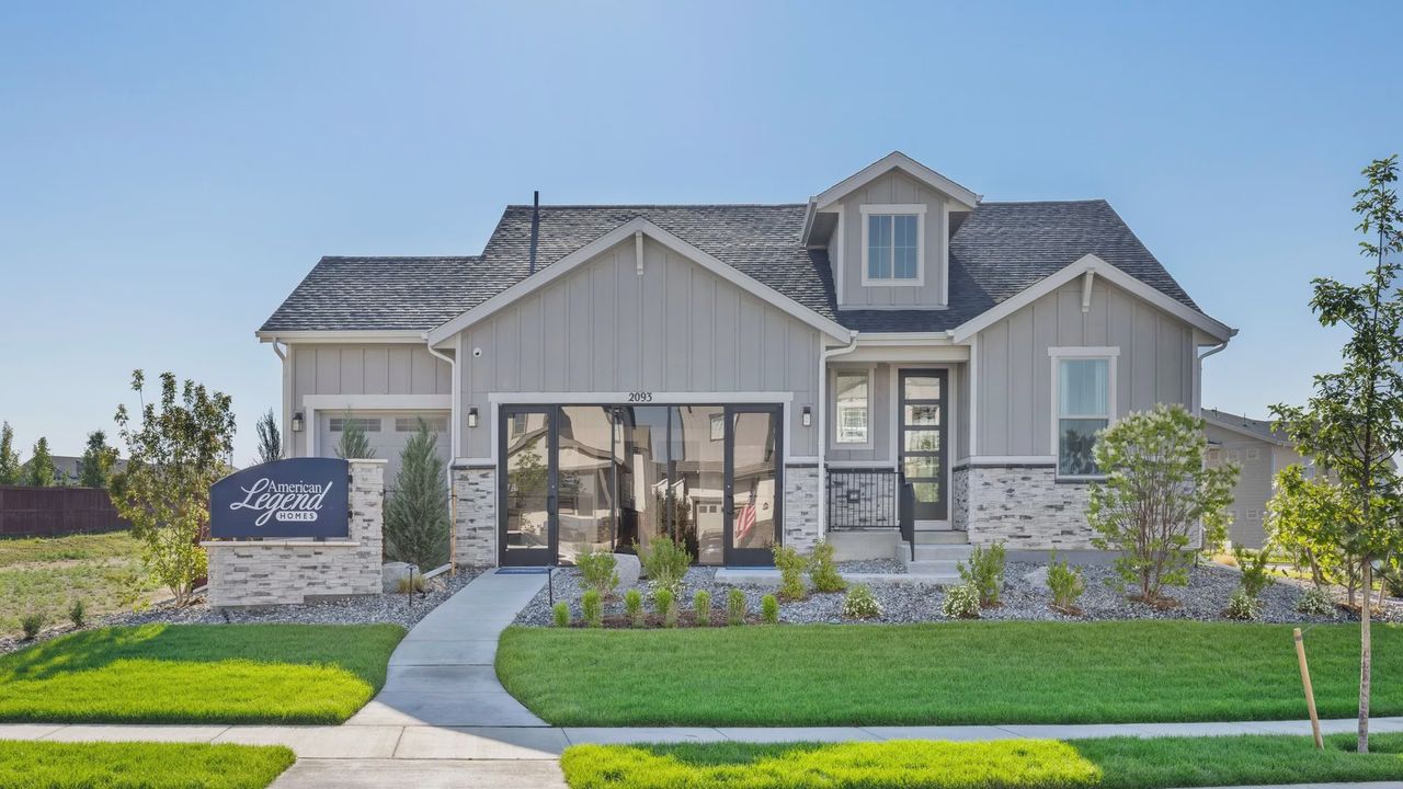 Front exterior of a home in the The Greens at RainDance National community, located in Windsor, CO (Image 2).