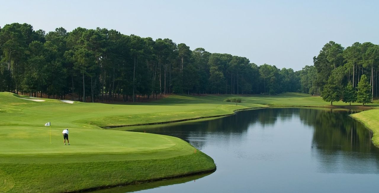 Golf course with pond Golf course with pond