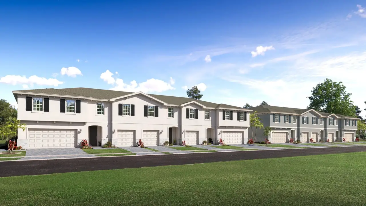 Front exterior of a home in the Nash Trail community, located in Greenacres, FL (Image 2).