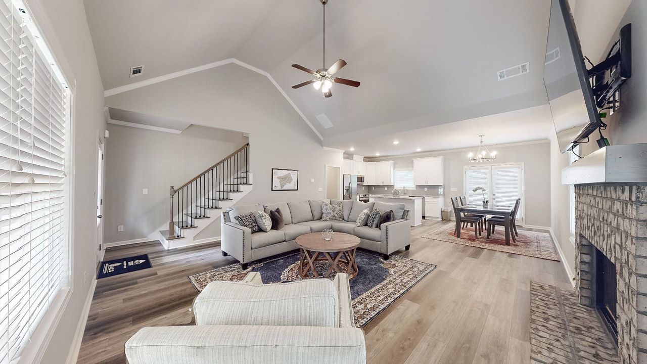 Furnished interior in a model home at Ellington Farm in Statham (Image 2).