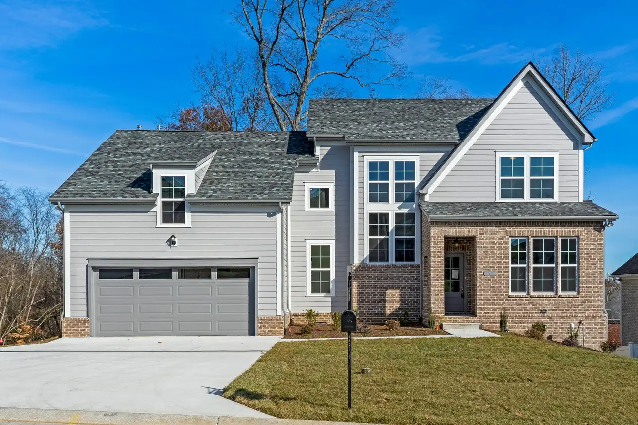 Front exterior of a home in the Woodcrest community, located in Smyrna, TN (Image 2).