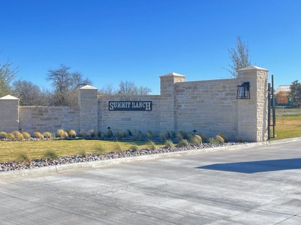 Entrance to the Parker County community in Weatherford, TX, featuring signage and landscaping (Image 2).