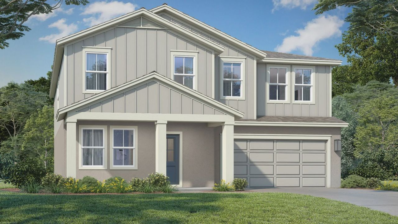 Front exterior of a home in the Woodlands Ranch community, located in Dundee, FL (Image 2).