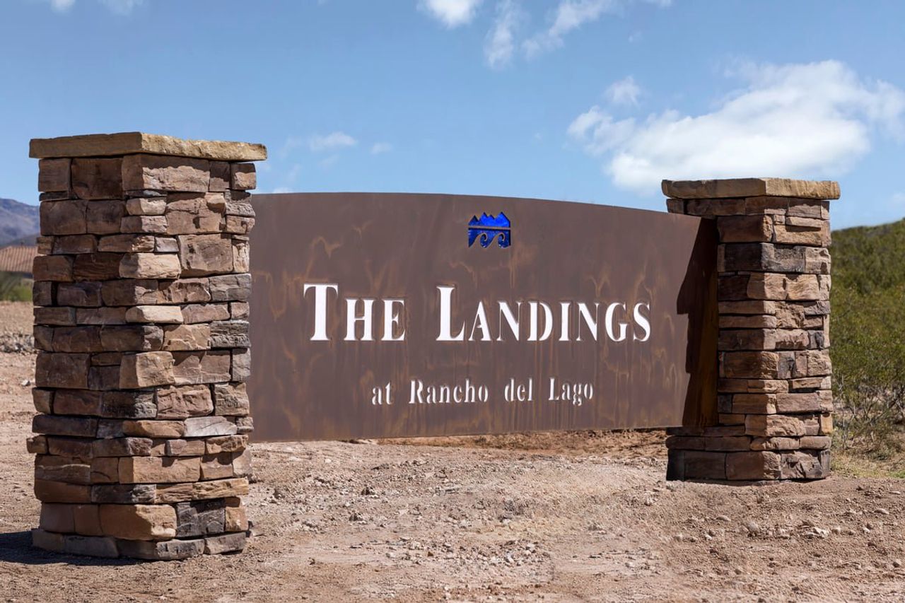 Entrance to the The Landings at Rancho Del Lago community in Vail, AZ, featuring signage and landscaping (Image 2).