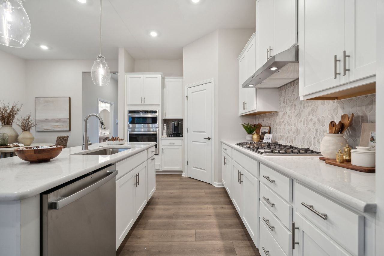 Furnished interior in a model home at The Coves on Lake Wylie Towns in Charlotte (Image 2).