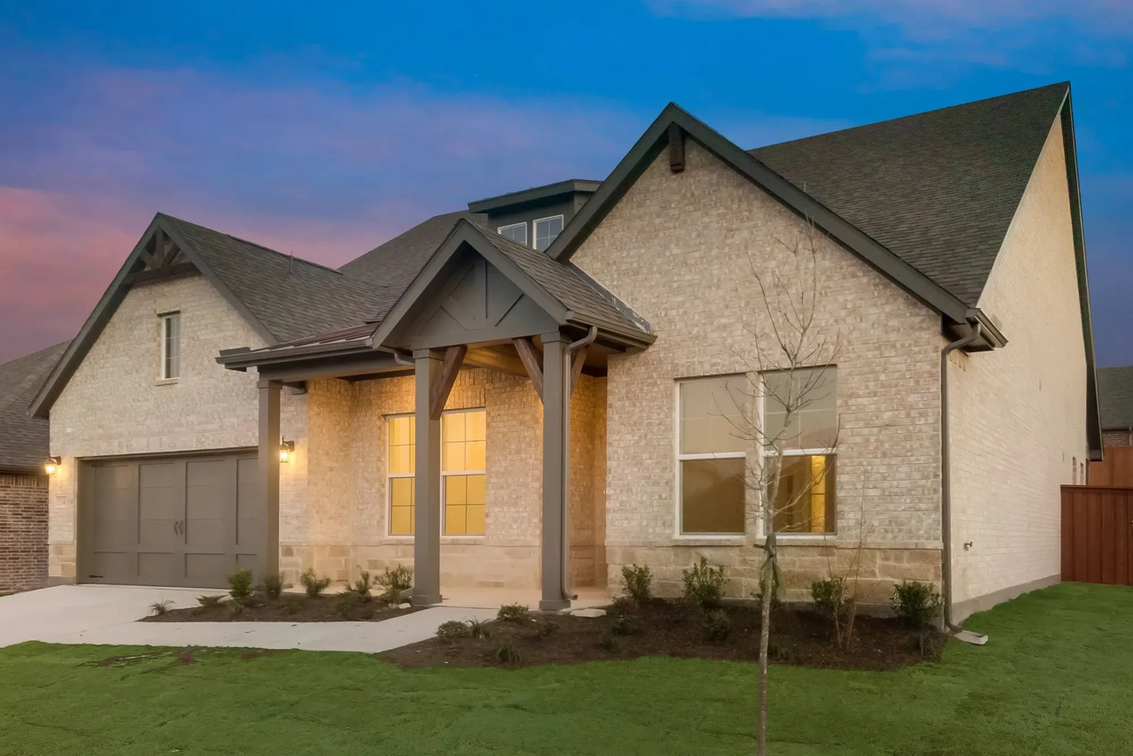 Front exterior of a home in the The Hollow community, located in Ennis, TX (Image 2).